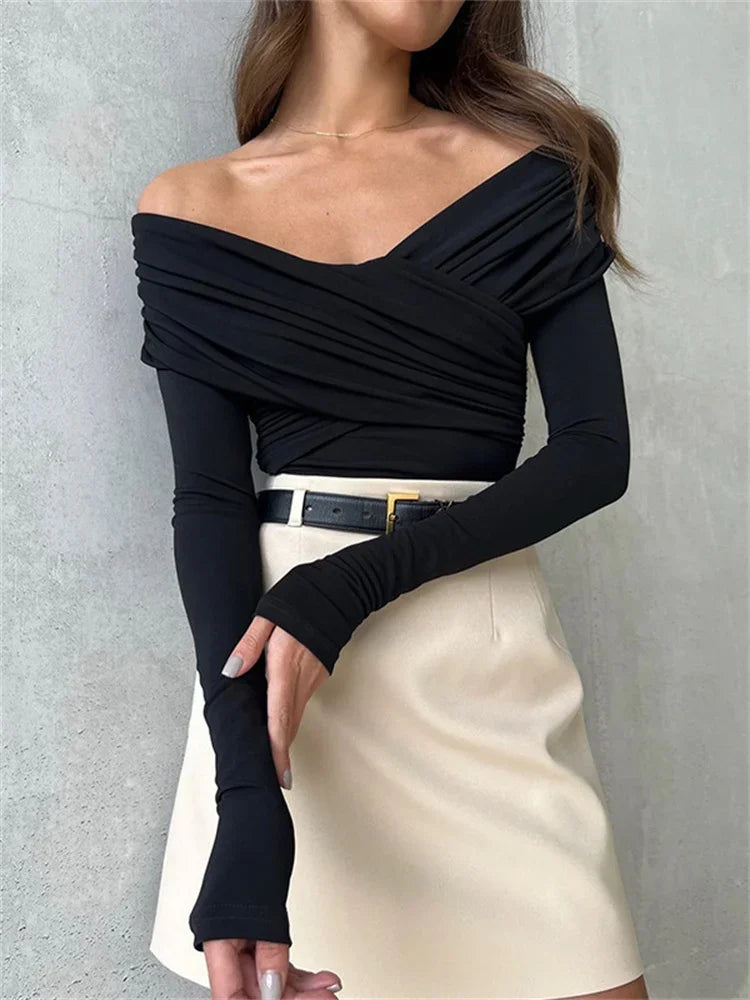 Elegant pleated off-the-shoulder women's bodysuit by WolffMode.