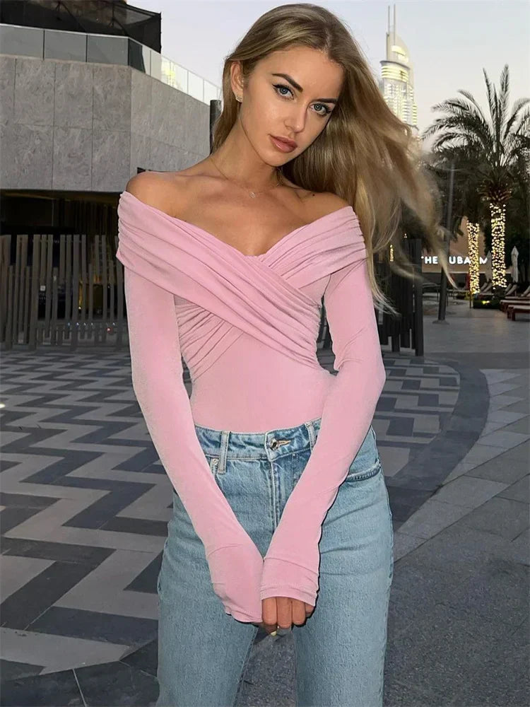 Elegant pleated off-the-shoulder women's bodysuit by WolffMode.