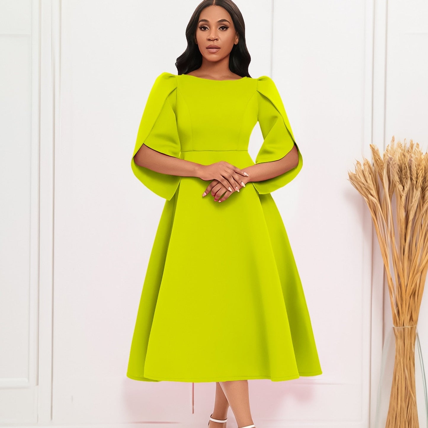 WolffMode: Grüne Chiffonkleid mit Rüschen